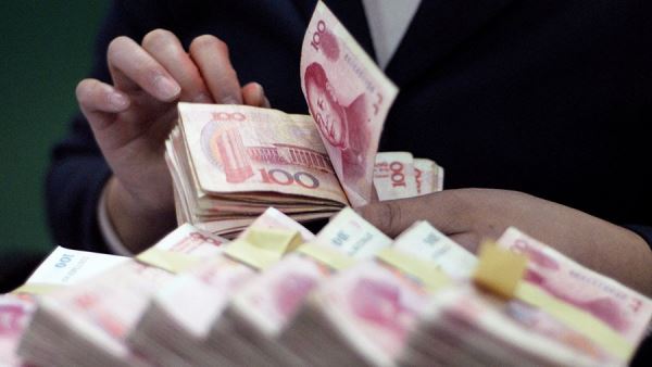 Доля юаня впервые превысила доллар в трансграничных расчетах Китая<br />
